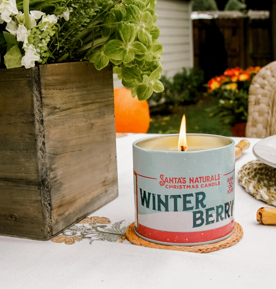 Christmas Cheer All Year Santas Naturals Christmas Candle Winterberry in rustic home setting