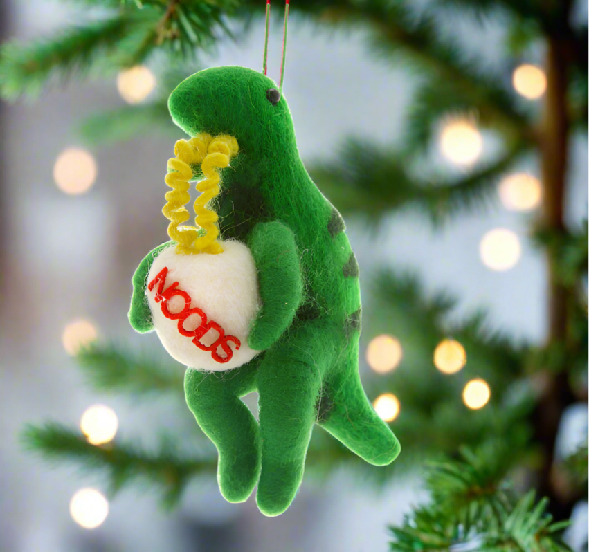 The Canton Christmas Shop Cody Foster Dinosaur with Ramen Noodles Soup Ornament on tree