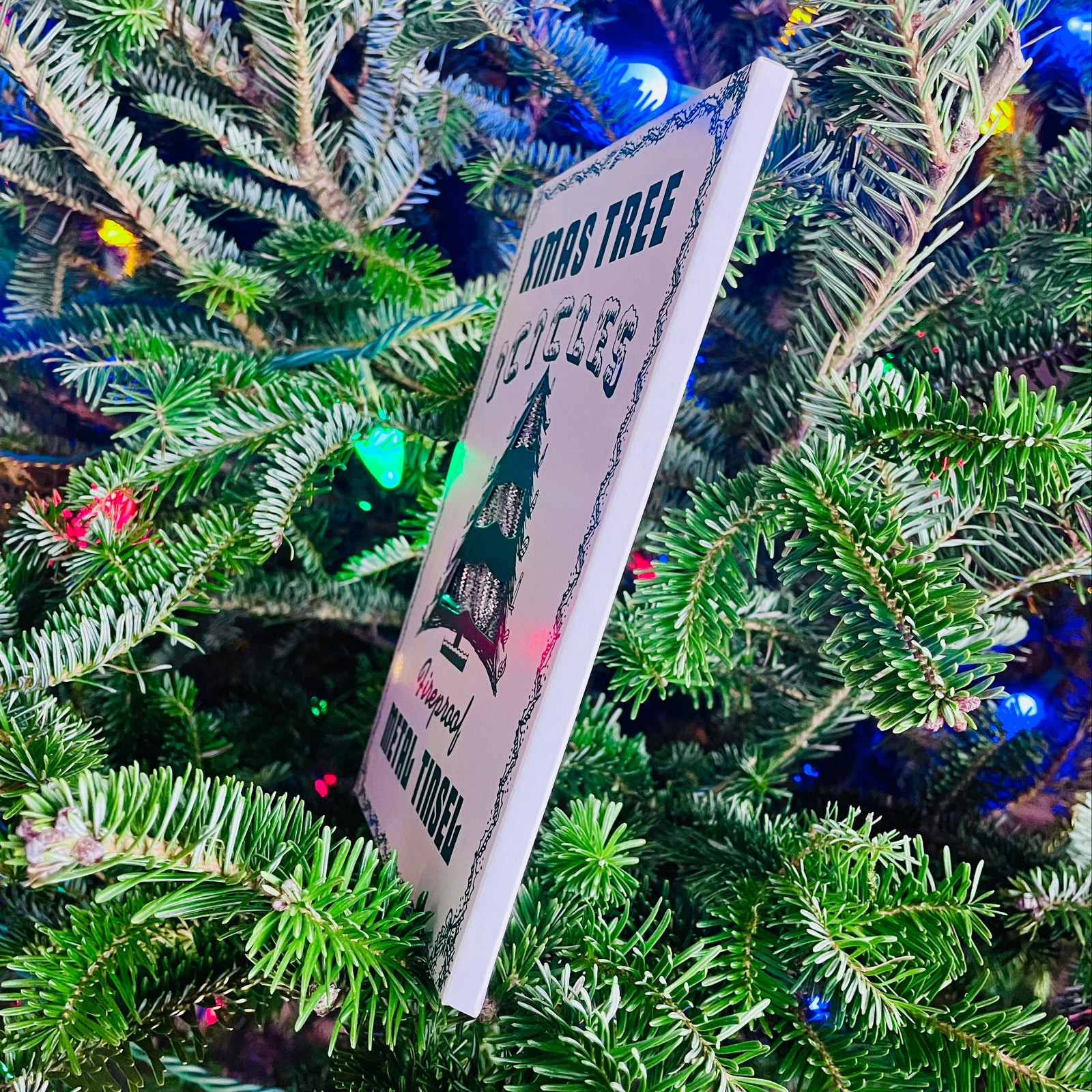 The Canton Christmas Shop Vintage Christmas Tree Icicles Fireproof metal Silver Tree Tinsel by Cody Foster