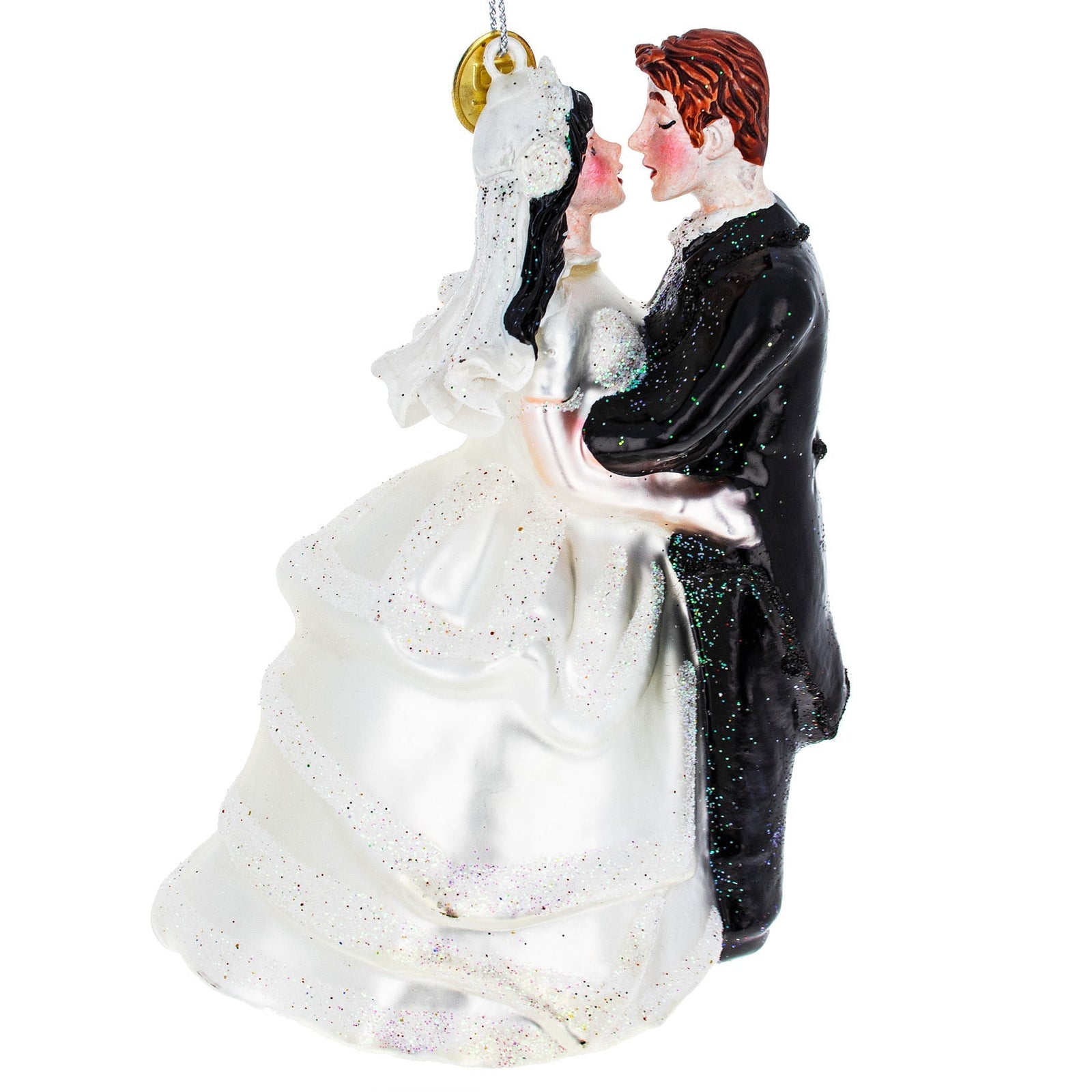 Decorative ornament of a bride and groom in wedding attire on a white background