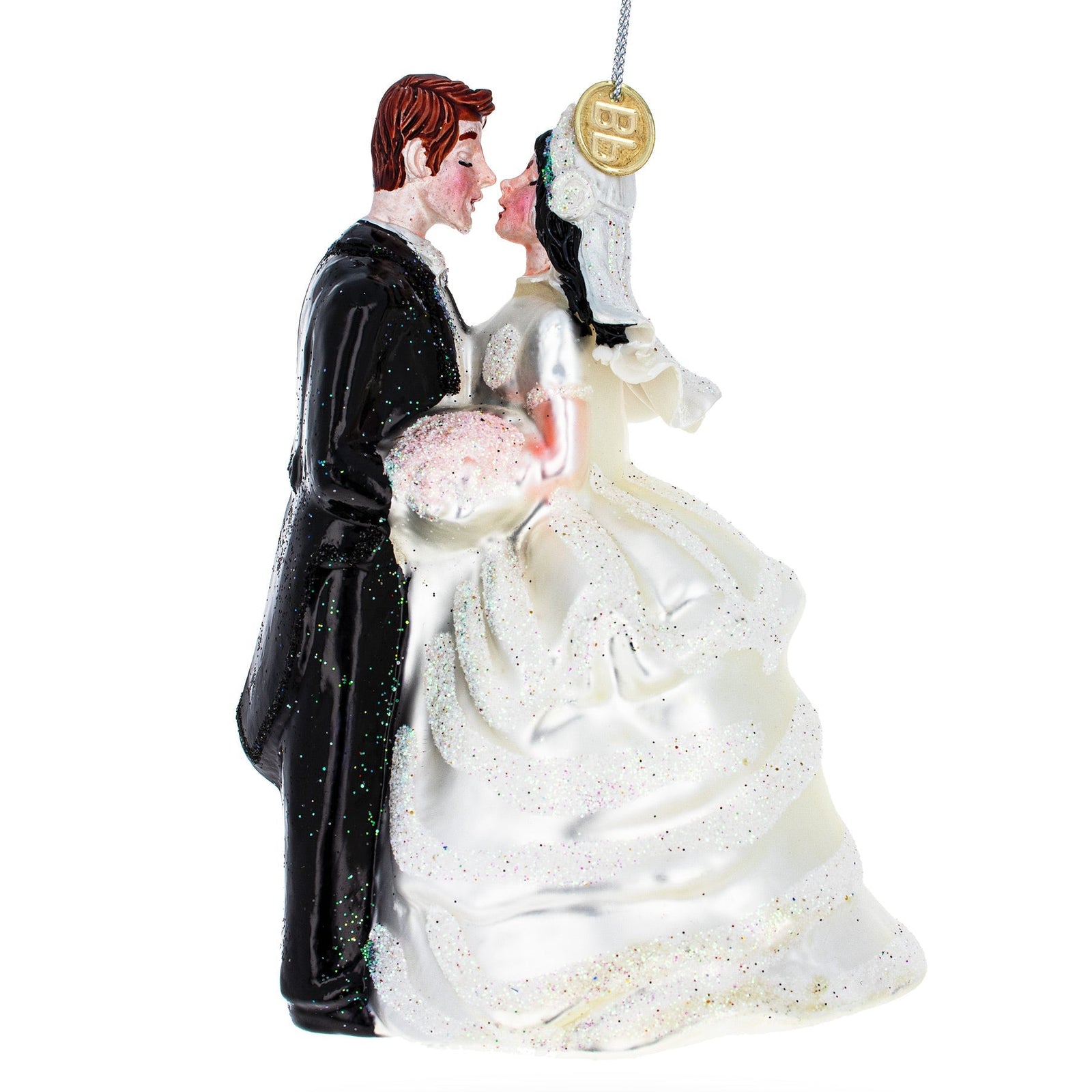 Decorative ornament of a bride and groom in wedding attire on a white background