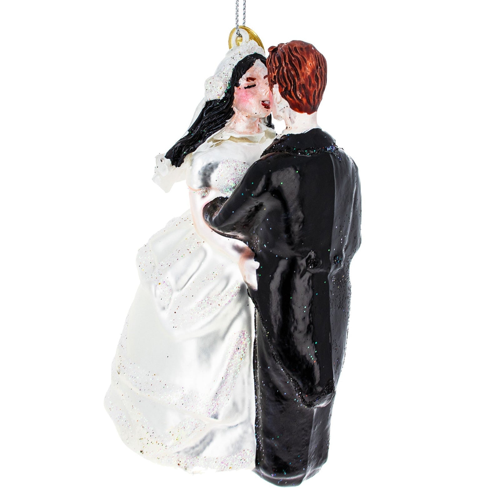 Decorative ornament of a bride and groom in wedding attire on a white background