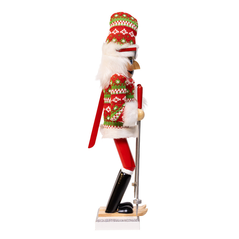 Christmas Cheer All Year 15" Ski Santa Nutcracker figurine wearing a festive sweater and hat on a white background in downhill ready position