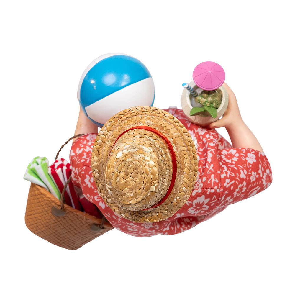 Christmas Cheer All Year Santa Claus figure in beach attire holding a drink, beach ball, and 'VACAY' bag on a white background