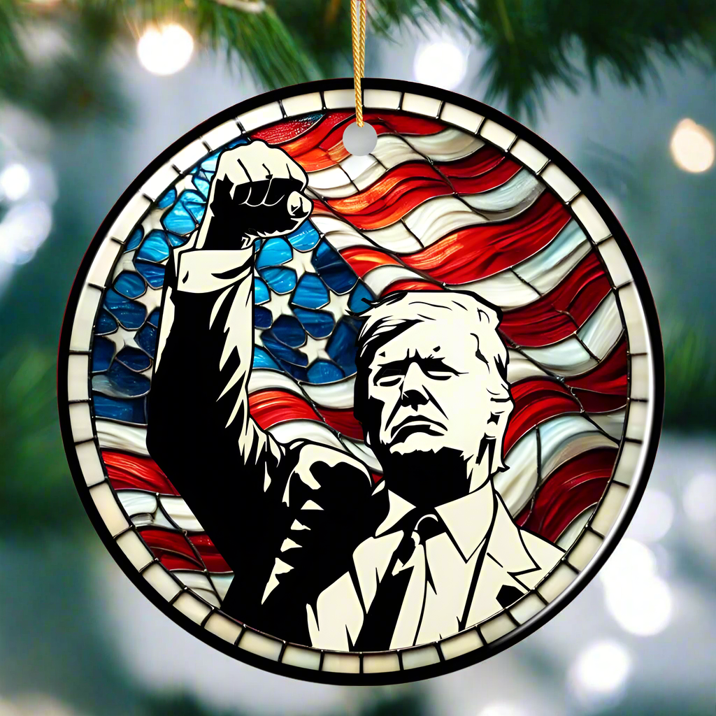 Decorative President Trump ornament with a stylized portrait and American flag design on stained glass with his fight fight fight arm in air 