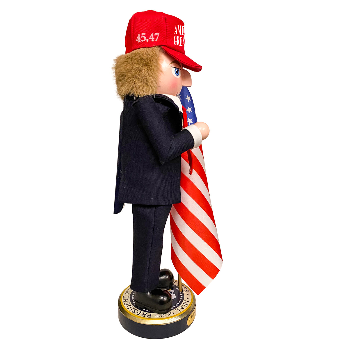Christmas Cheer All Year Donald J. Trump Presidential Nutcracker Make America Great Again Red Baseball Cap Navy Suit American Flag on Pedestal by Kurt Adler G5013