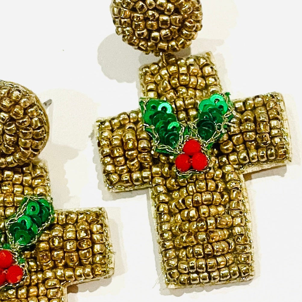 Christmas Cheer All Year Gold cross-shaped earrings with holly and berries