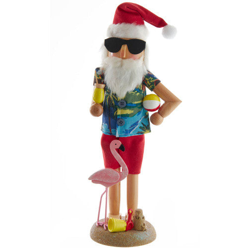 Christmas Cheer All Year Beach Santa Nutcracker with Beach themed Christmas tree