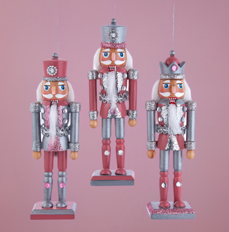 Christmas Cheer All Year 6" Pink and Pewter Nutcracker Ornaments Assorted on pink background