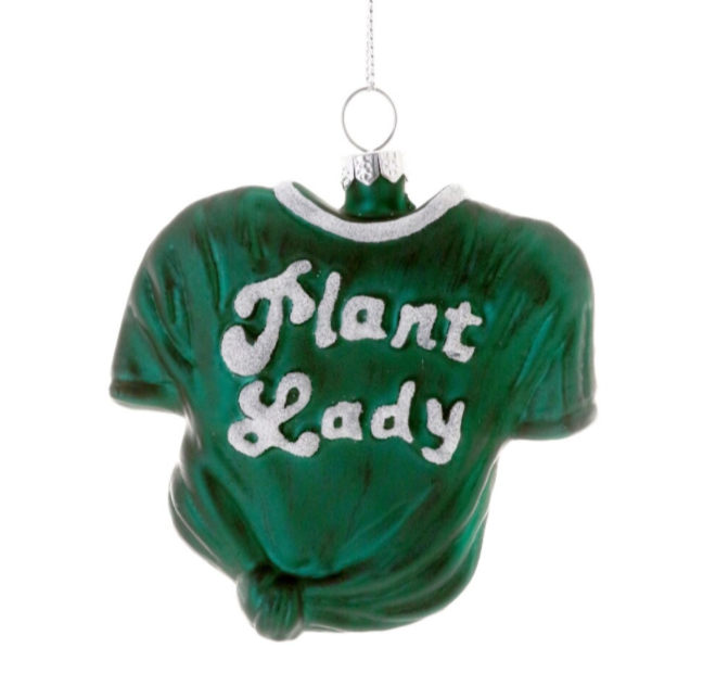 Green ornament shaped like a t-shirt with 'Plant Lady' text on a white background christmas cheer all year