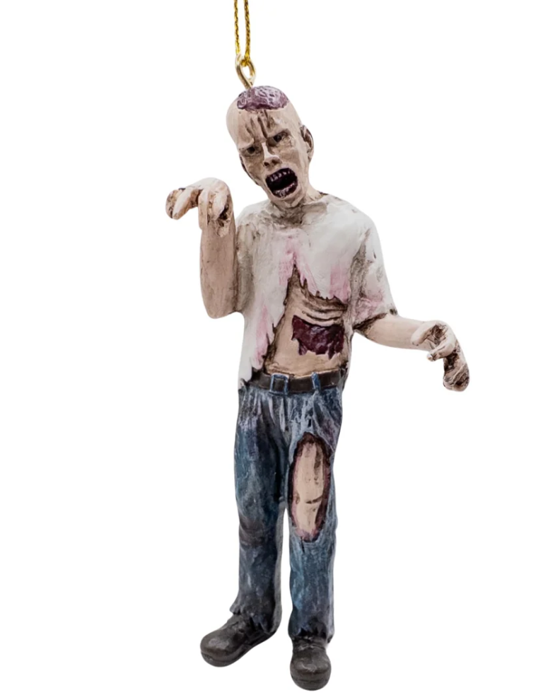Christmas Cheer All Year A zombie Halloween ornament hanging by a gold string, featuring a distressed, decaying figure with an open shirt, ribs exposed, ripped jeans, bloody leg and a bloody head with skull exposed